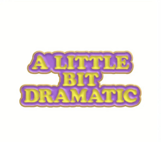 'A Little Bit Dramatic' enamelled metal pin badge